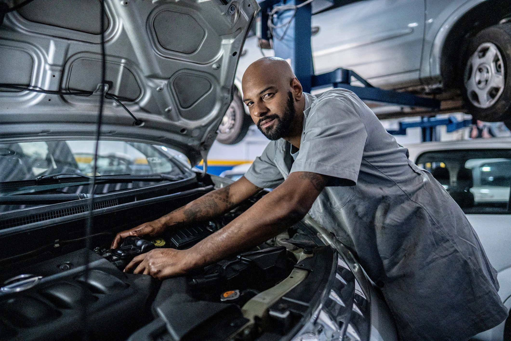 ASE certified mechanic working