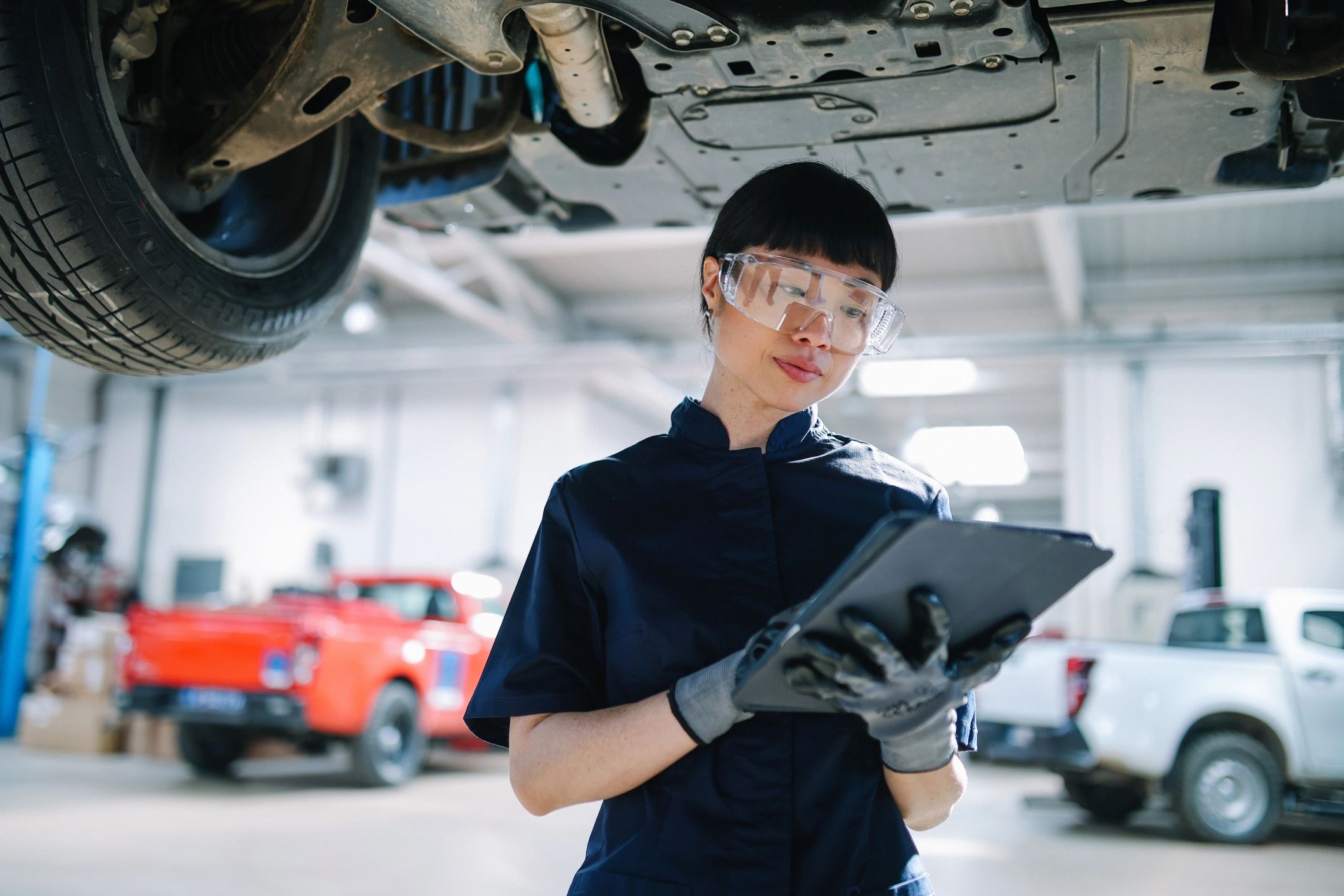 auto mechanic working on Japanese car